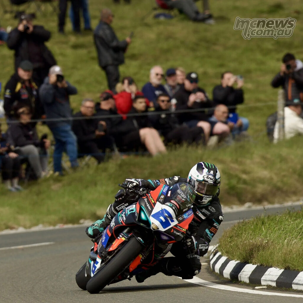 Michael Dunlop leans the number 6 Ducati Panigale V2 through a left-hander during the 2026 Supersport TT.