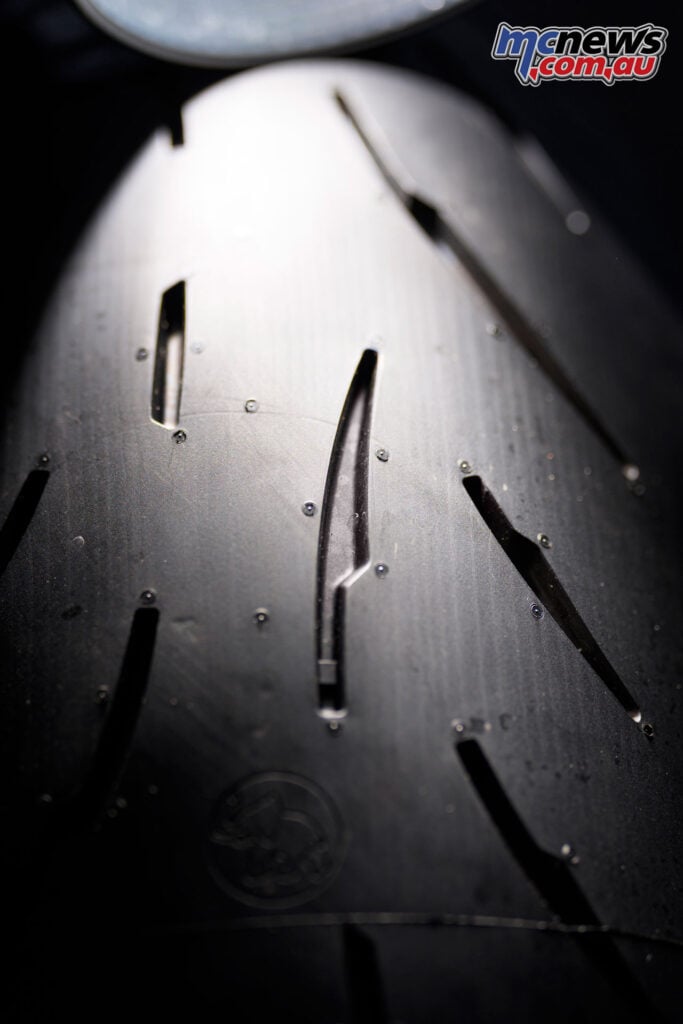 Close-up of Metzeler Sportec 01 tread grooves and Dynatread design