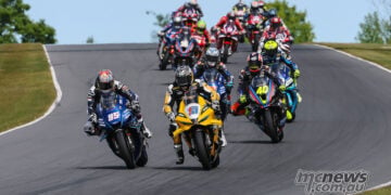 JD Beach passing PJ Jacobsen during MotoAmerica Superbike Race Two at Road America.