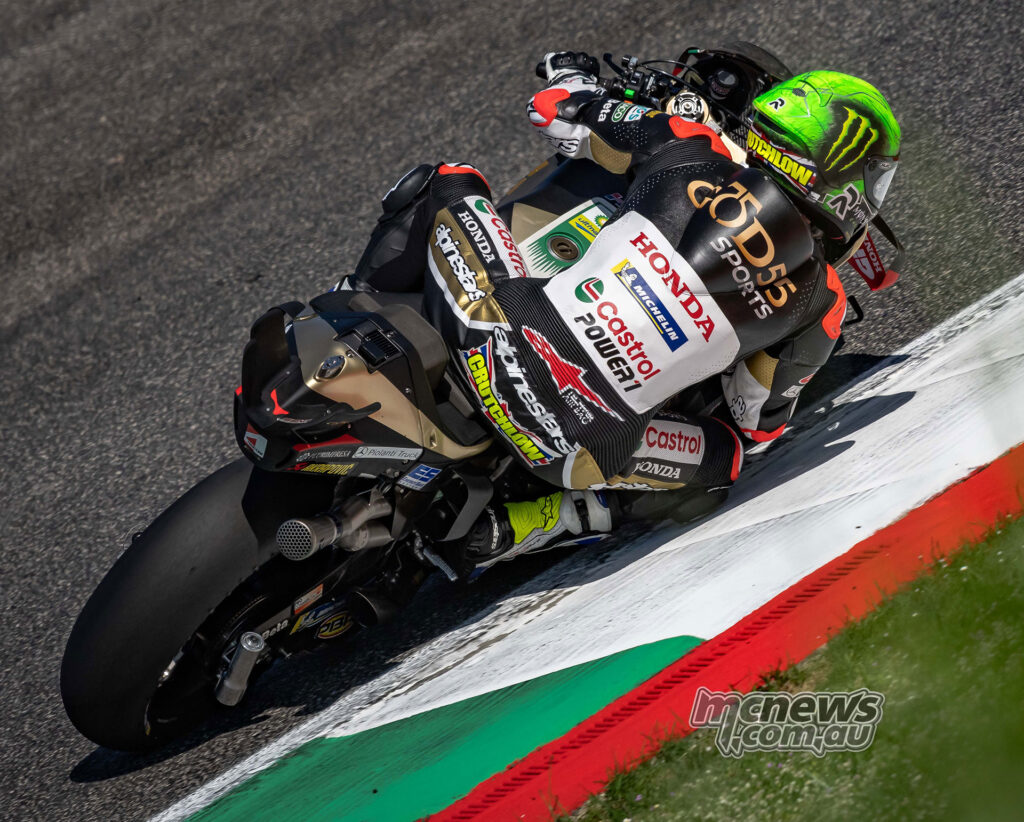 Rear view of Cal Crutchlow riding the Castrol Honda LCR bike over the Mugello ripple strip.