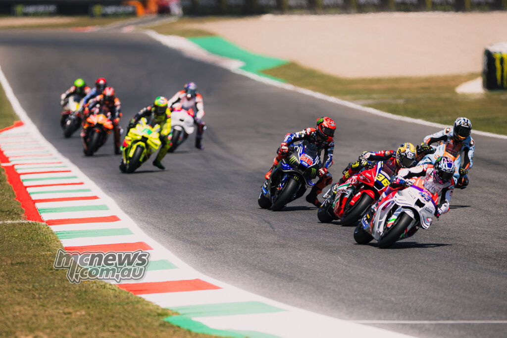 Jack Miller rides ahead of Joan Mir during the MotoGP race at Mugello.