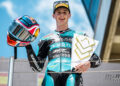 Maximo Quiles holds his Moto3 winner’s trophy on the Hungarian Grand Prix podium.