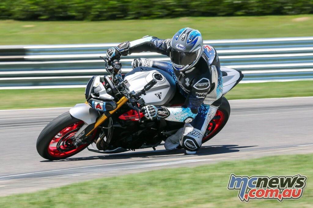 Triumph Street Triple 765 RX on track in Matte Aluminium Silver and red