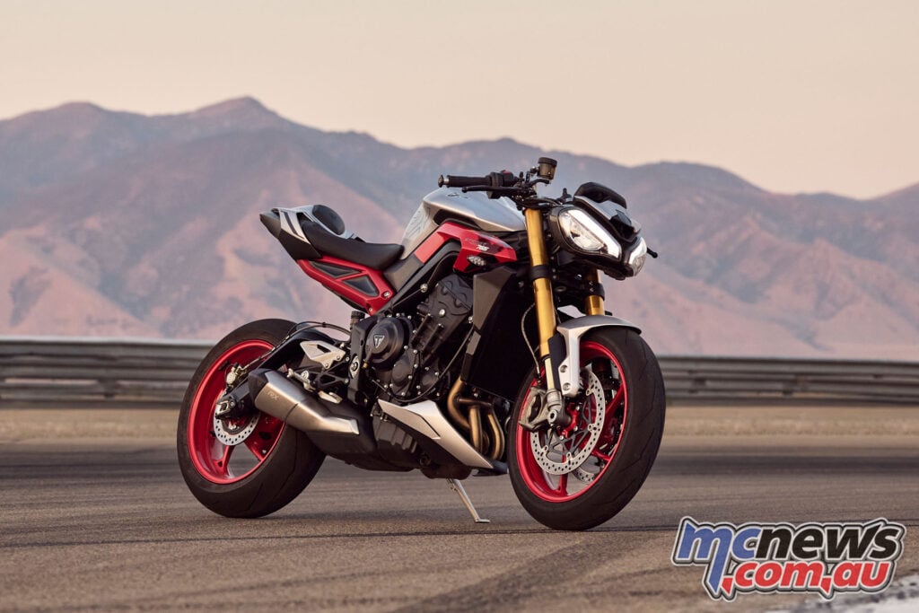 2026 Triumph Street Triple 765 RX in Matte Aluminium Silver with red wheels and RX graphics