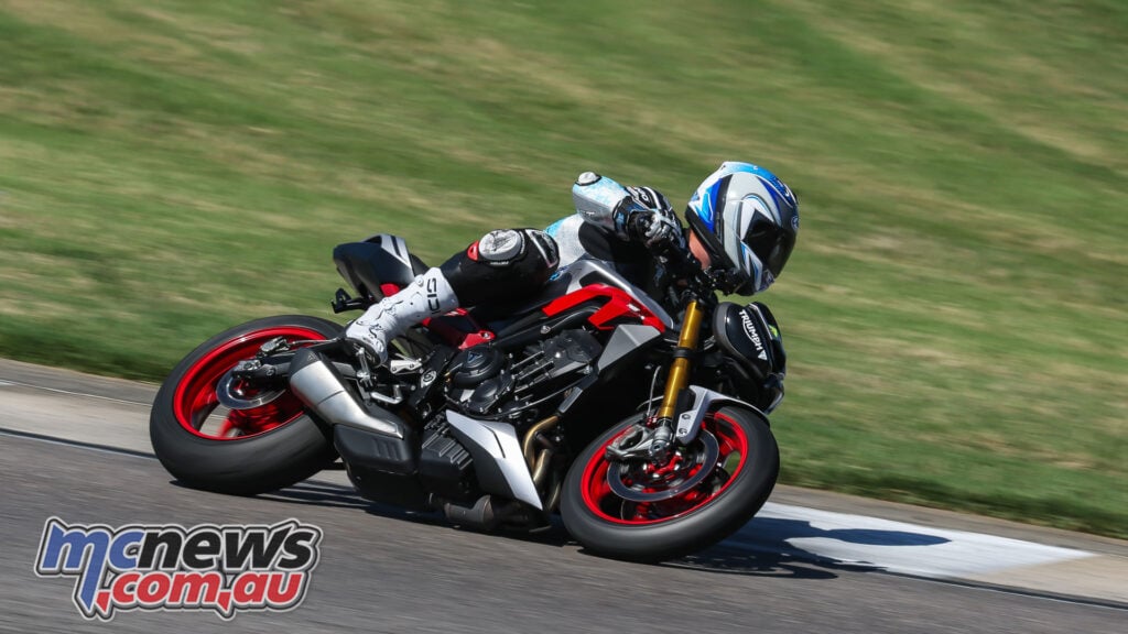 Triumph Street Triple 765 RX cornering hard on track