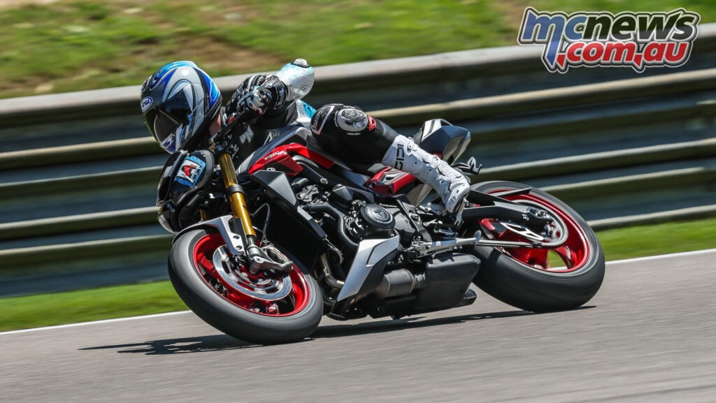 Triumph Street Triple 765 RX leaned over on track at Barber Motorsports Park