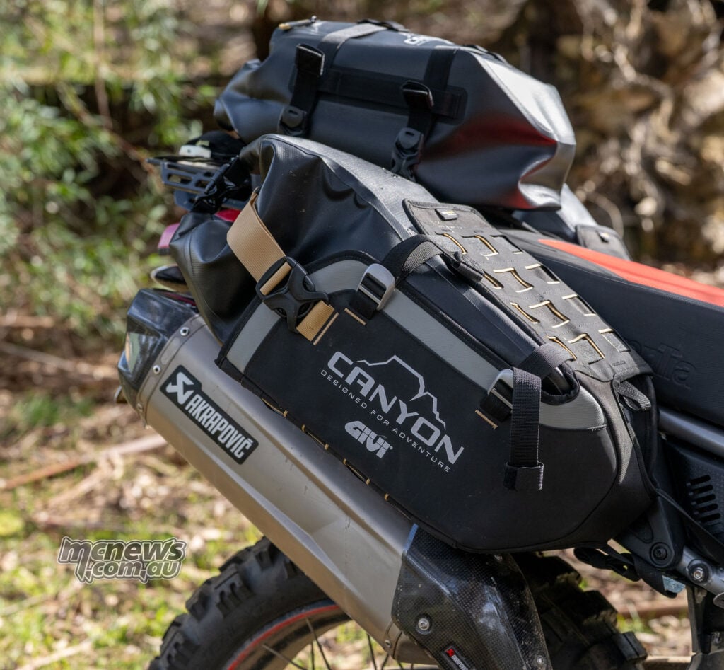 Aprilia Tuareg 660 fitted with the black Givi Canyon GRT721B rackless soft-luggage system.