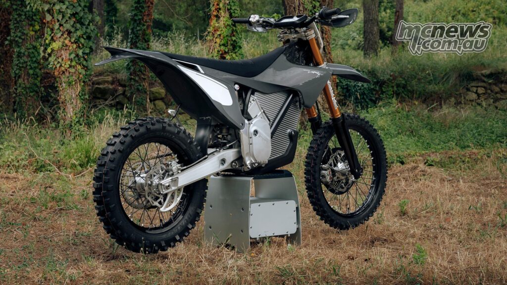 Rear three-quarter view of the Forest Gray Stark VARG EX Factory Edition on a motorcycle stand.