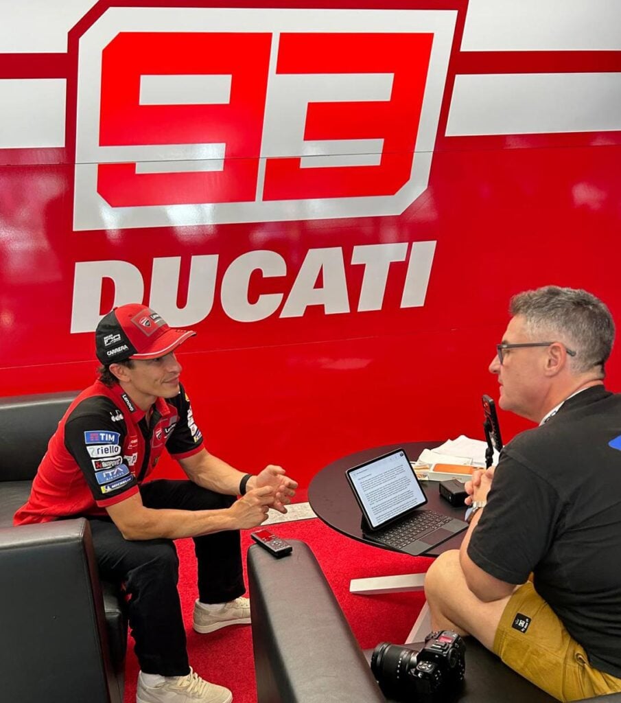 Marc MΓ‘rquez speaks with MCNews.com.au editor Trevor Hedge inside Ducati hospitality at World Ducati Week 2026