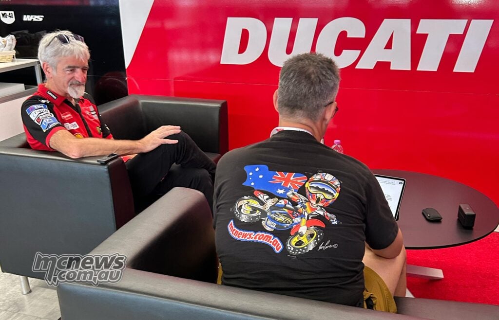 Trevor Hedge interviews Luigi “Gigi” Dall’Igna in front of a Ducati backdrop at World Ducati Week 2026.