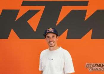 Alex Marquez in front of KTM branding after signing with Red Bull KTM Factory Racing for the 2027 MotoGP season.