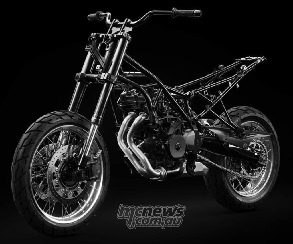 Norton Atlas chassis with exposed steel trellis frame, engine, suspension, wheels and swingarm.