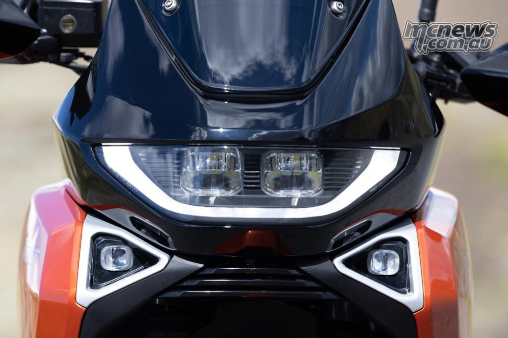 Norton Atlas front lighting with twin LED projectors, daytime running light and lower cornering lights illuminated.