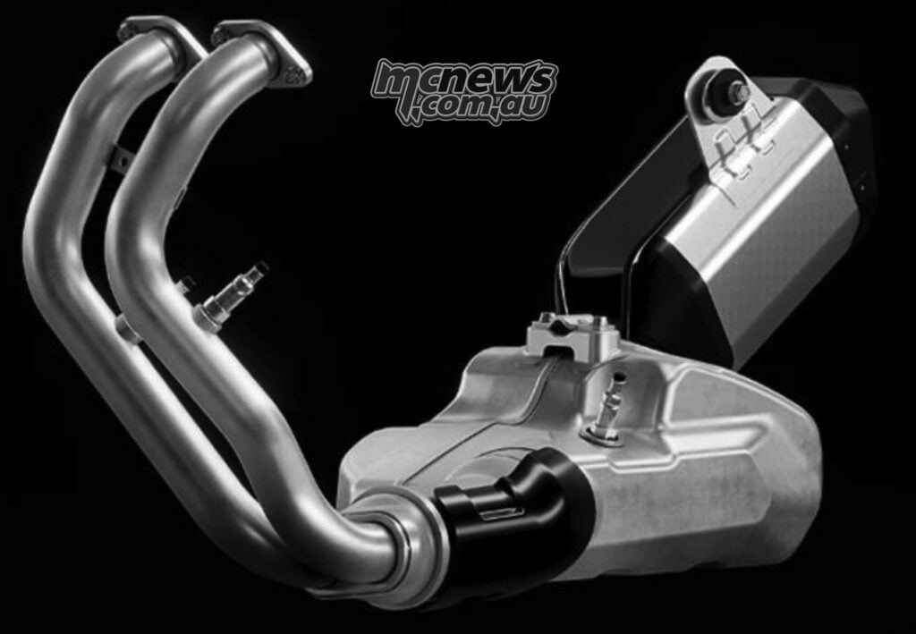 Norton Atlas exhaust assembly showing the header pipes, catalytic converter and silencing chambers