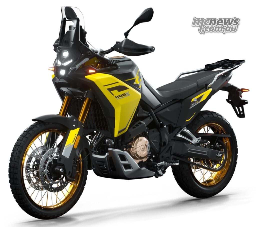 Yellow and black VOGE DS800X Rally adventure motorcycle in a studio.