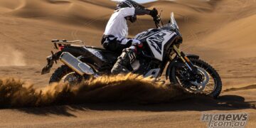 VOGE DS800X Rally adventure bike sliding through sand dunes.