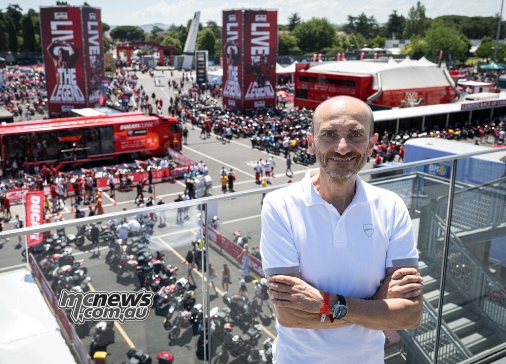 Ducati CEO Claudio Domenicali overlooking a busy World Ducati Week 2026 paddock at Misano.