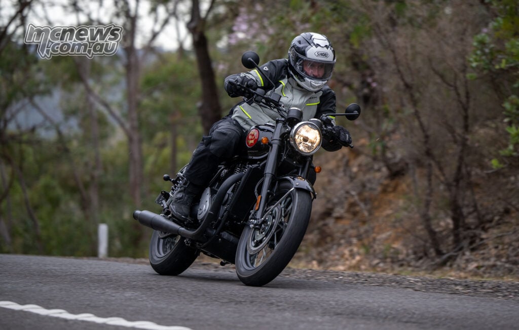 Trev riding a black BSA Gold Star 650 on rough NSW roads