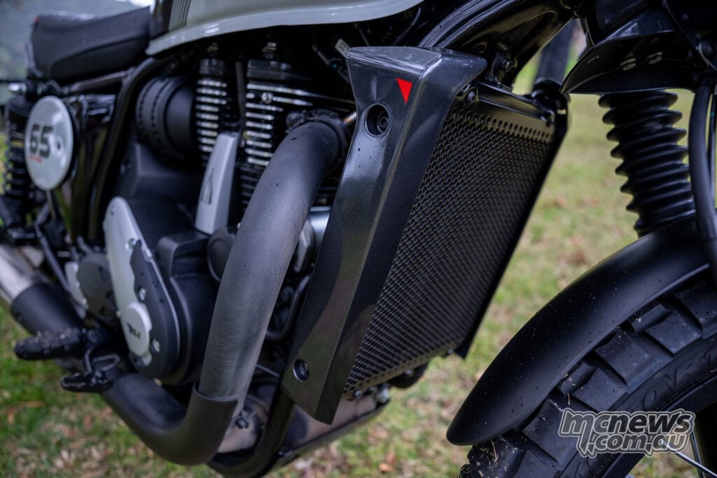 BSA Scrambler 650 showing its radiator and liquid-cooled single-cylinder engine