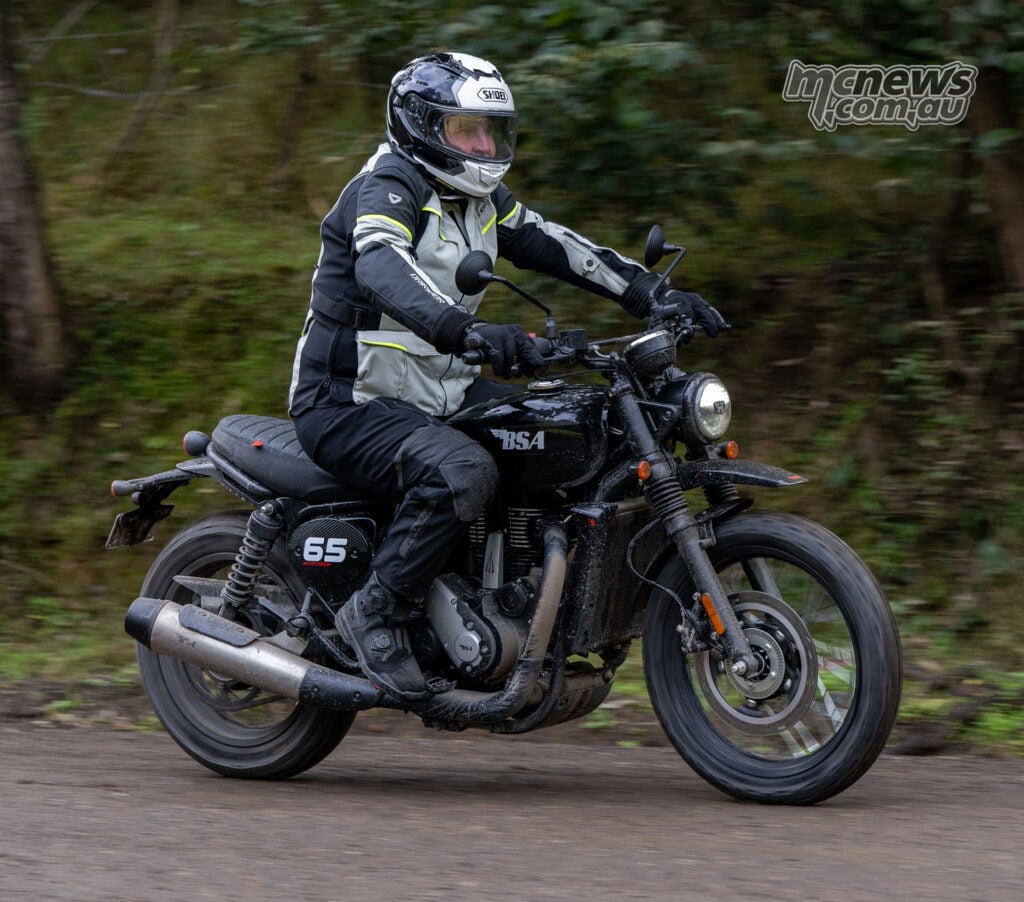 Trev riding a Raven Black BSA Scrambler 650