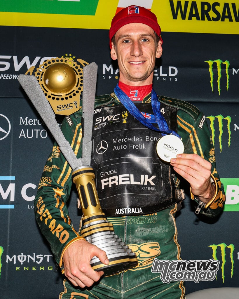Max Fricke holds his Speedway World Cup gold medal and the championship trophy in Warsaw.