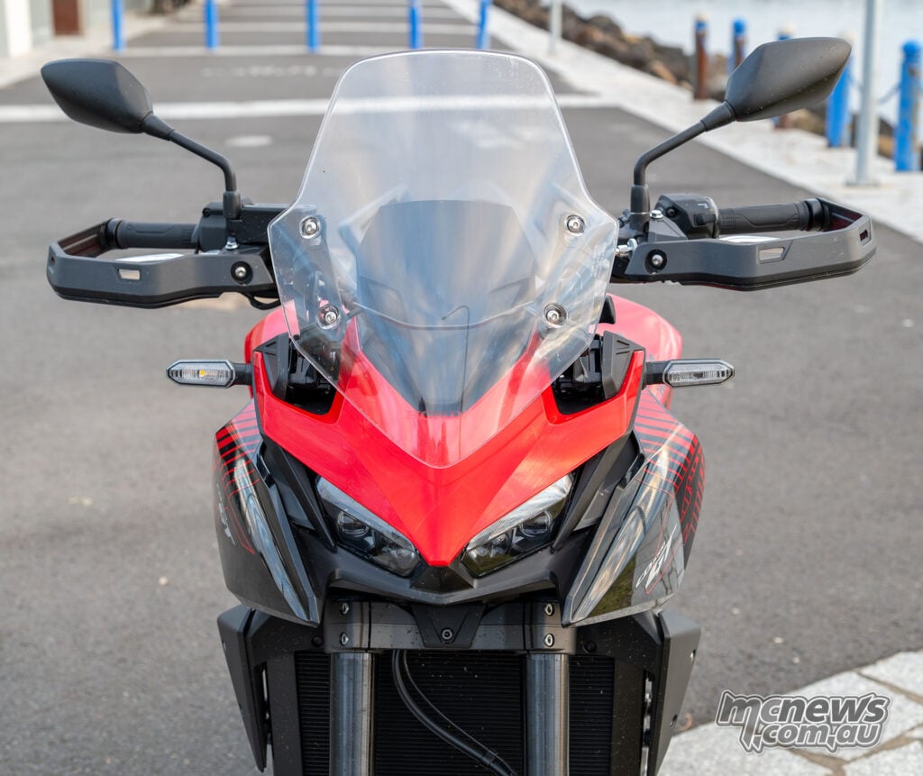 Front view of the Honda CB1000GT windscreen, mirrors, handguards, indicators and LED headlights.