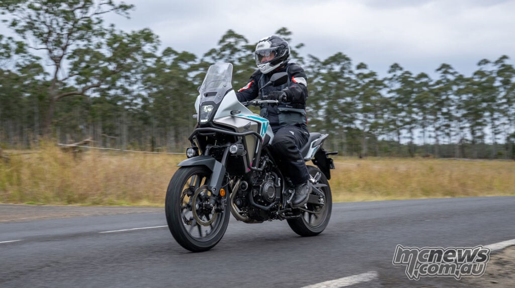 Trevor Hedge riding a white 2026 Honda NX500 on a Queensland country road