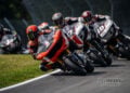 Kyle Wyman leads Troy Herfoss and Hayden Gillim through a Mid-Ohio corner.
