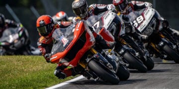 Kyle Wyman leads Troy Herfoss and Hayden Gillim through a Mid-Ohio corner.