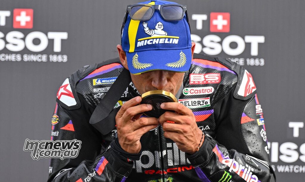 Jorge Martin kisses his winner's medal after victory in the 2026 British MotoGP Sprint.