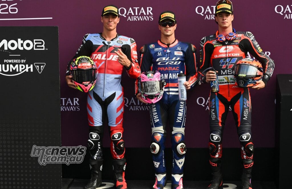 Alonso Lopez, Izan Guevara and Ivan Ortola pose after qualifying on the Moto2 front row at Silverstone.