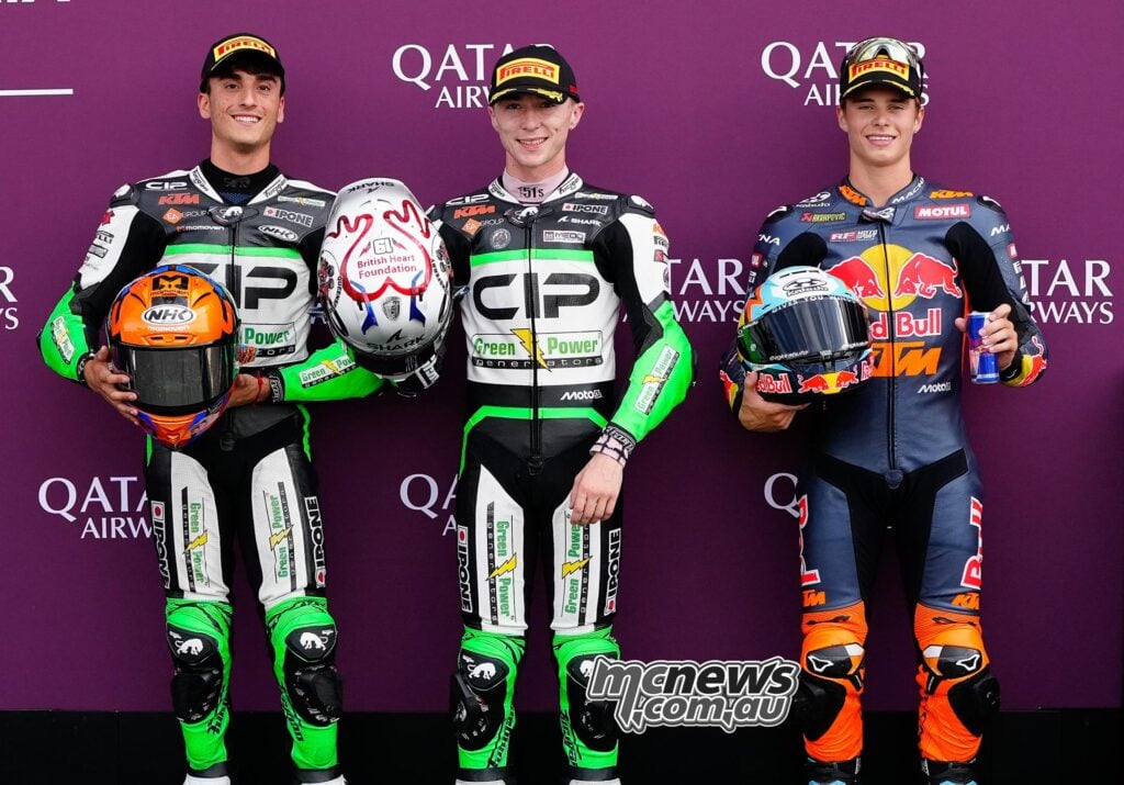Adrian Cruces, Scott Ogden and Valentin Perrone pose after Moto3 qualifying at the 2026 British Grand Prix.