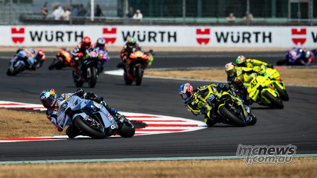 Alex Marquez leads Ai Ogura and Fabio Di Giannantonio during the 2026 British MotoGP at Silverstone.