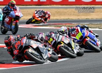 Manuel Gonzalez leads Tony Arbolino and Filip Salac during the 2026 British Moto2 Grand Prix.