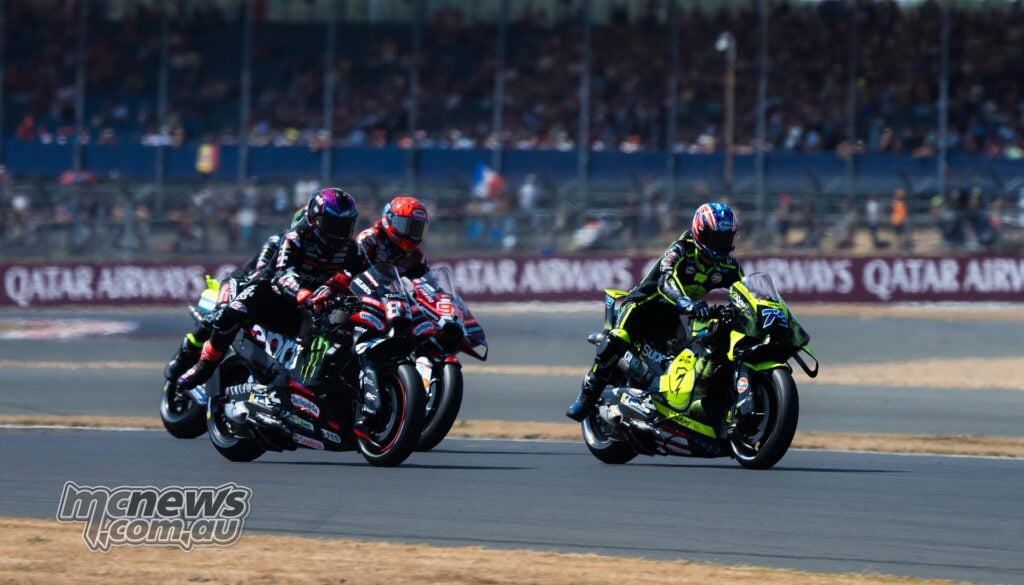 Ai Ogura, Jorge Martin and Marc Marquez battling during the 2026 British MotoGP at Silverstone.