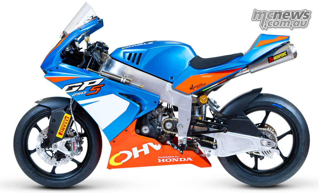 Left-side studio profile of the Honda-powered Ohvale GP-5 250 with blue, red and white bodywork.