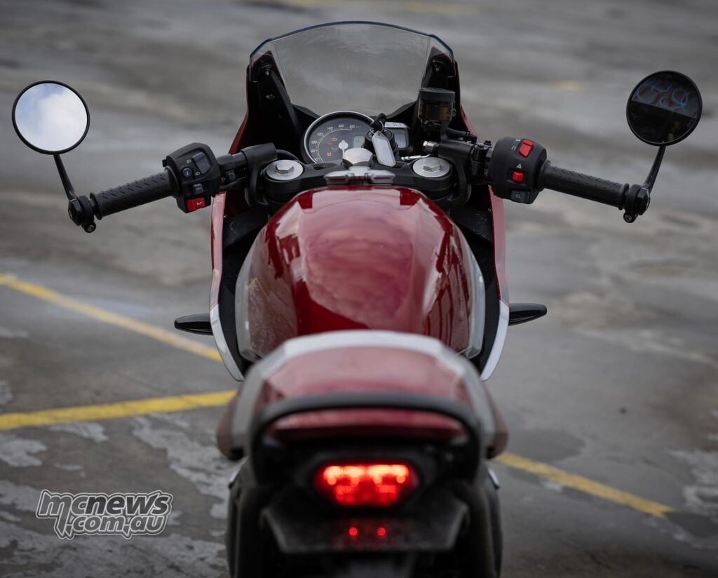 The Thruxton 400 may feel sporty for a new rider, but is still a fair way off a full supersport machine, with the clip-ons above the triple
