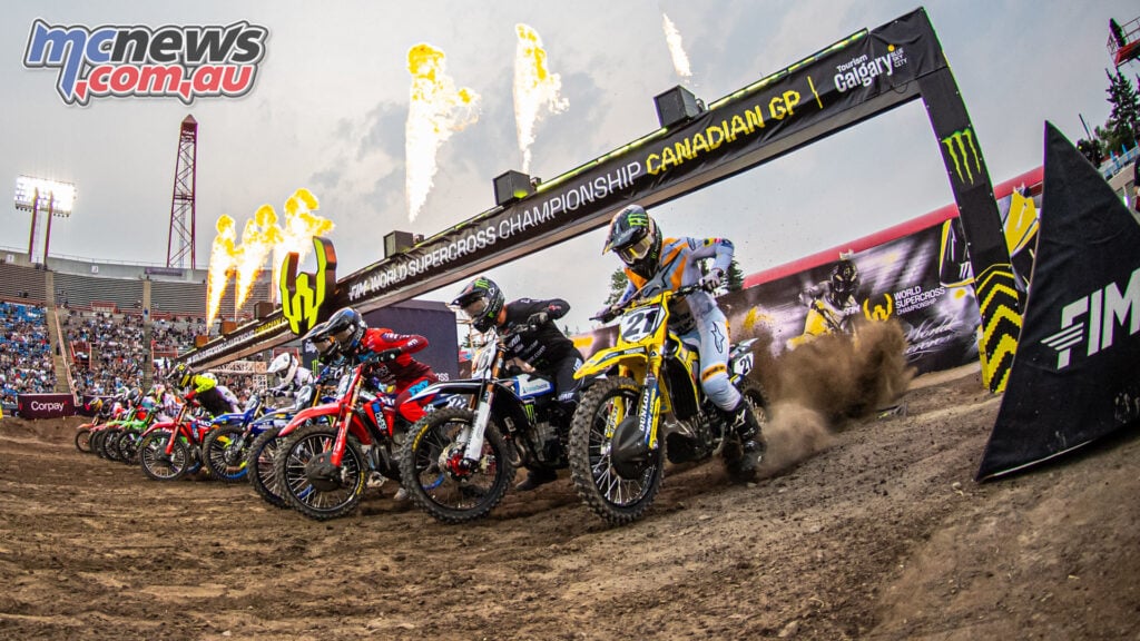 The SX1 field accelerates from the starting gate at the 2026 World Supercross opener in Calgary