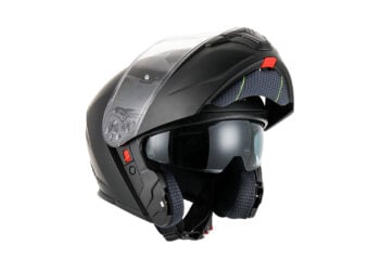 Matt Black RXT 918 modular helmet with its chin bar raised and internal sun visor deployed