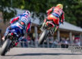 Rear view of Ryan Vickers airborne on the Honda with Bradley Ray following on the Yamaha at Cadwell Park.