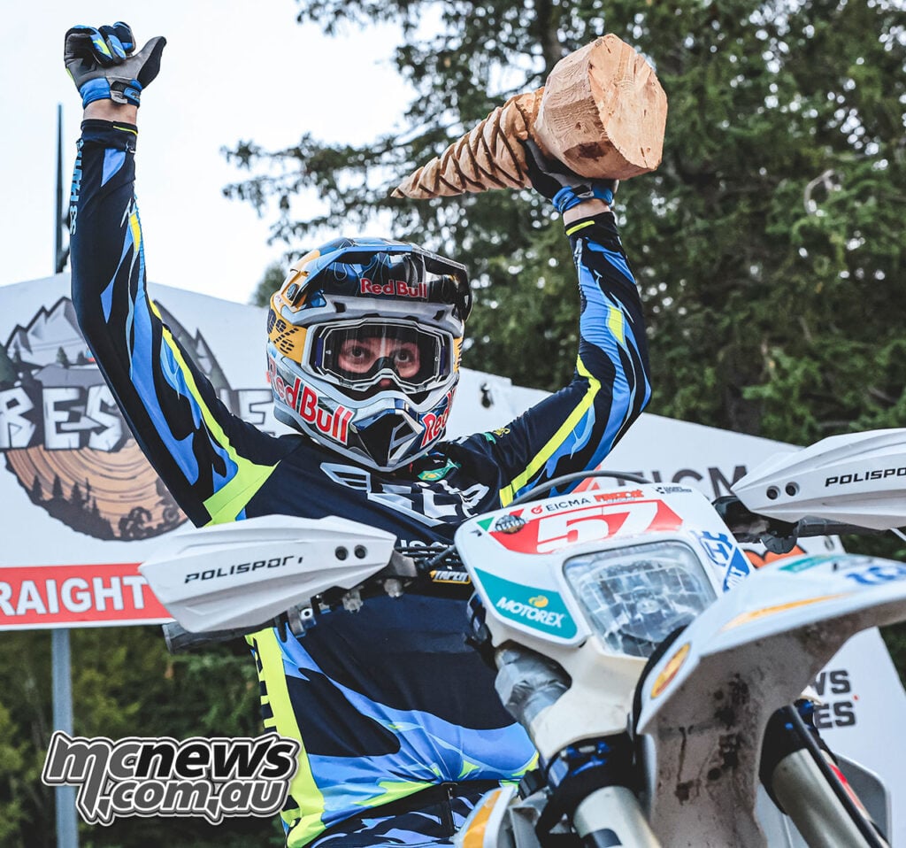Billy Bolt holding the wooden trophy after winning the Abestone Straight Rhythm competition.