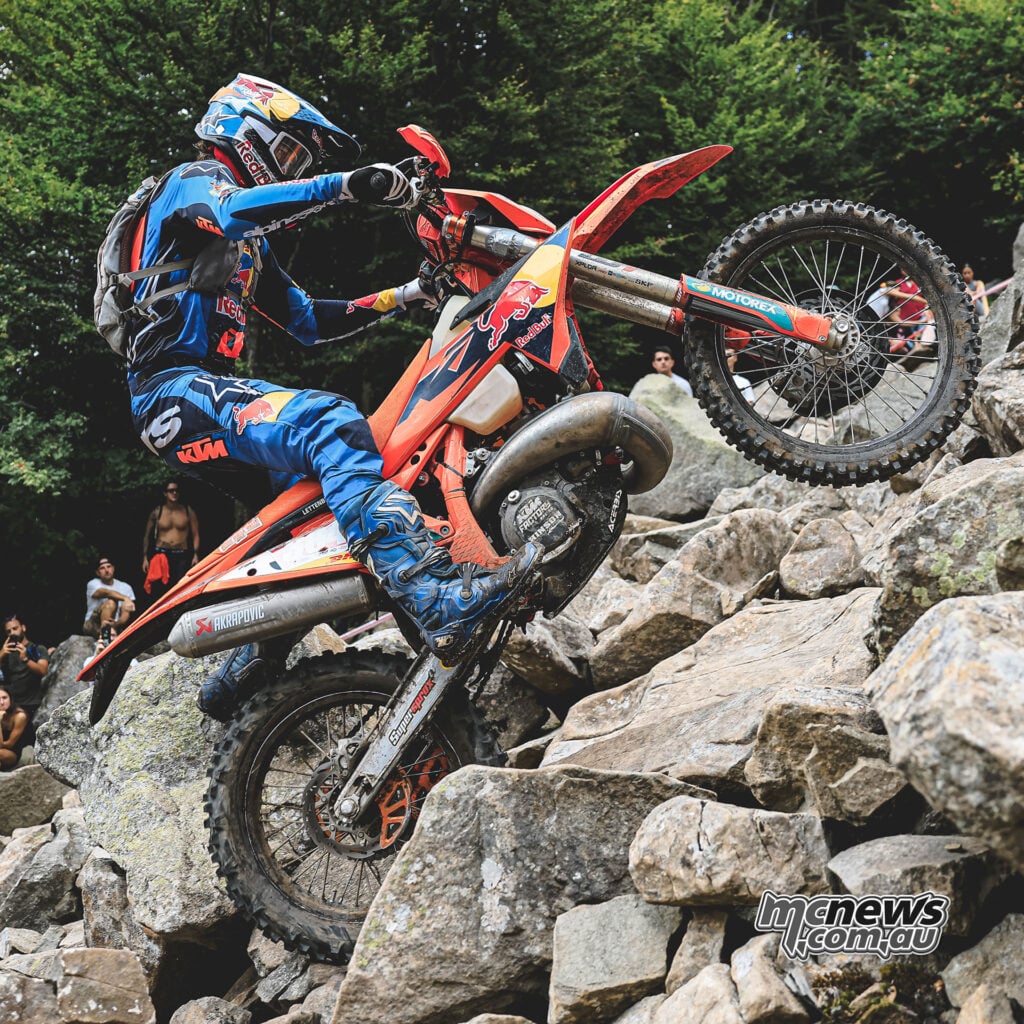 Manuel Lettenbichler climbing across large boulders on his KTM at the Abestone Hard Enduro.