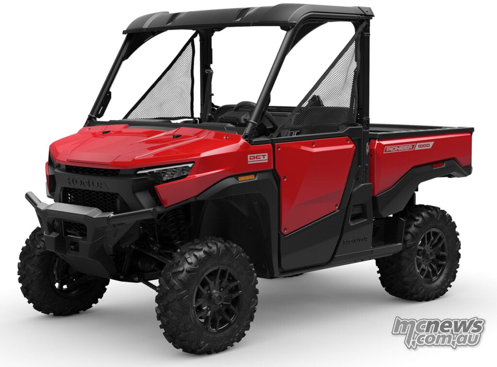 Front three-quarter studio view of red 2026 Honda Pioneer SXS1000-3 Deluxe