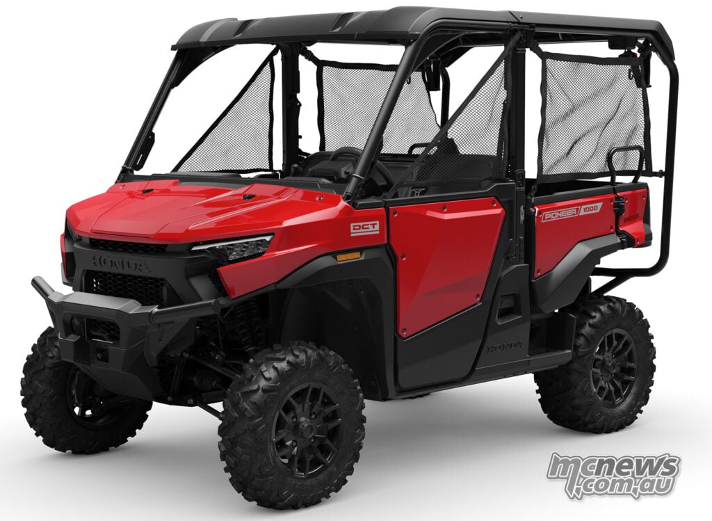 Front three-quarter studio view of red Honda Pioneer SXS1000-5 Deluxe