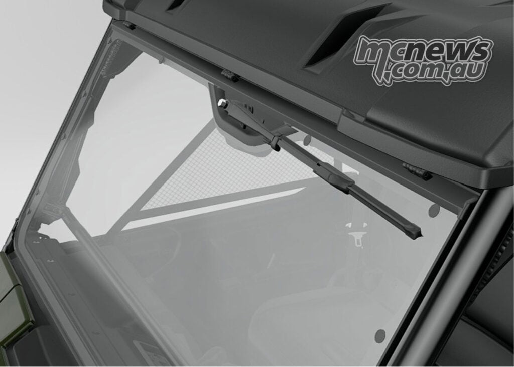 Close-up of optional Tip-Out Glass Windshield fitted to a Honda Pioneer SXS1000 Deluxe