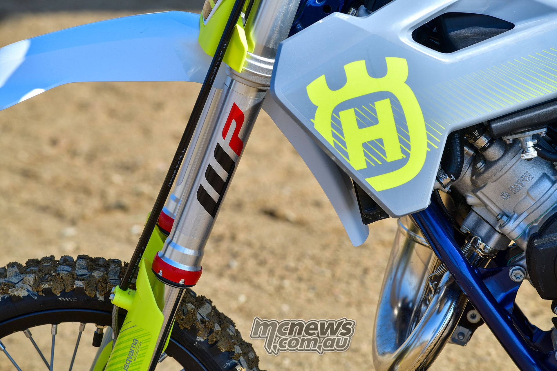Detail of the WP fork, front mudguard and radiator shroud on the 2026 Husqvarna TC 65.