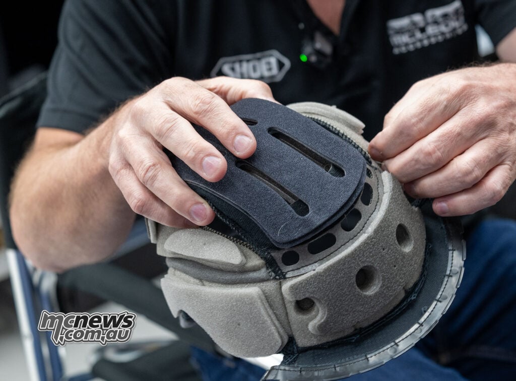 Damien Irwin completing the PFS crown-pad fitment on Trev’s centre liner.
