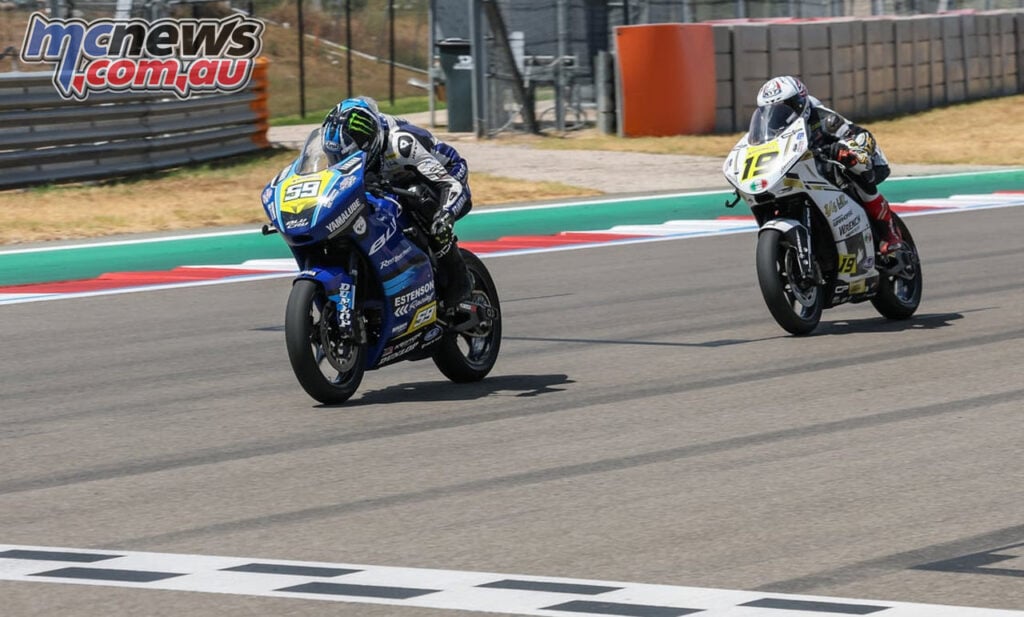 Sam Drane on the blue number 59 Talent Cup machine ahead of Nathan Gouker on the white number 19 at COTA.