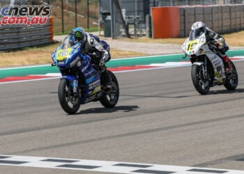 Sam Drane on the blue number 59 Talent Cup machine ahead of Nathan Gouker on the white number 19 at COTA.