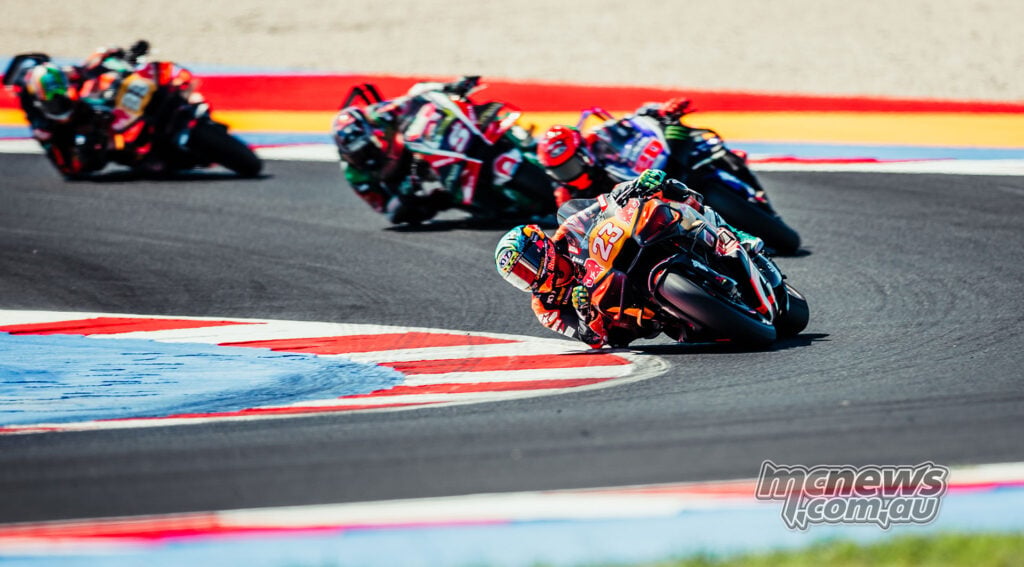 Enea Bastianini leads Fabio Quartararo, Johann Zarco and Brad Binder through a corner at Misano.